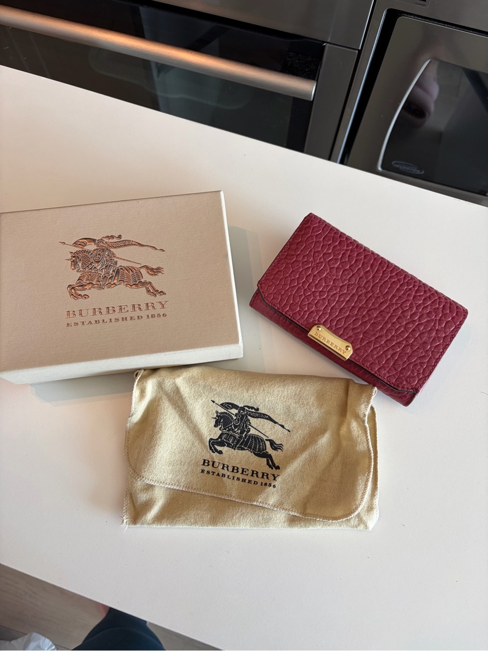 Burberry Pebbled Leather Card Case in Deep Berry with Gold Plaque